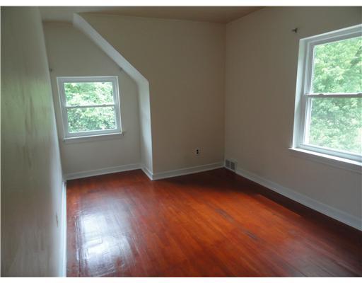 5752 Phillips Road Gibsonia, PA 15044 - Photo 14 of 18 Bedroom. One of the bedrooms showing hardwood that is under carpeting thruout the home