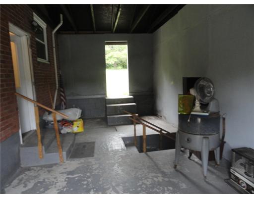 5752 Phillips Road Gibsonia, PA 15044 - Photo 18 of 18 Other. Breezeway between house and garage. With a little imagination could be made into a quaint area. Doorway you see leads out on the back yard/patio