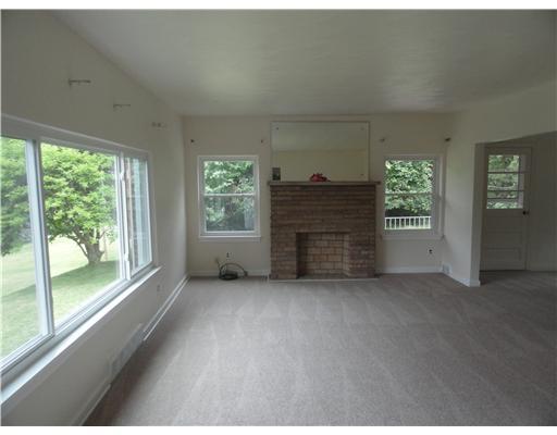5752 Phillips Road Gibsonia, PA 15044 - Photo 7 of 18 Living Room. Spacious, bright Living Room with Log burning fireplace. Fireplace hasn t been used for a few years. New Casrpeting. There is Hardwood under carpet.
