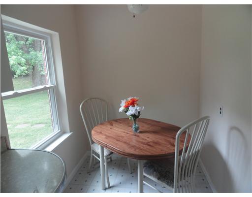 5752 Phillips Road Gibsonia, PA 15044 - Photo 10 of 18 Kitchen. Cozy breakfast kook in kitchen looking out into the private yard.