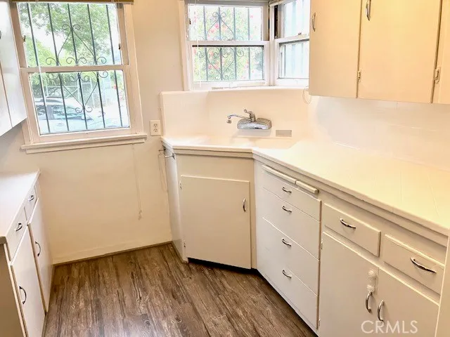 a view of storage and utility room with a window