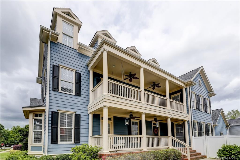 170 Mills Lane, Unit 761 Fort Mill, SC 29708 - Photo 1 of 35 a front view of a house with a yard