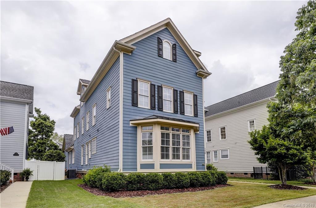 170 Mills Lane, Unit 761 Fort Mill, SC 29708 - Photo 2 of 35 a front view of a house with garden
