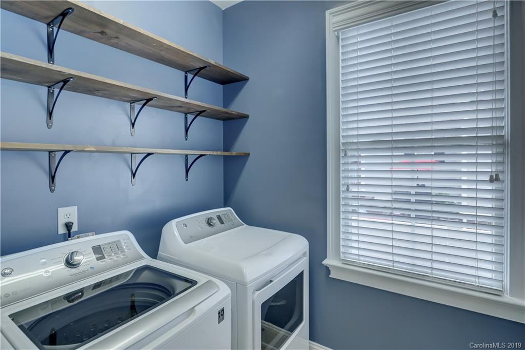 170 Mills Lane, Unit 761 Fort Mill, SC 29708 - Photo 14 of 35 a utility room with dryer and washer