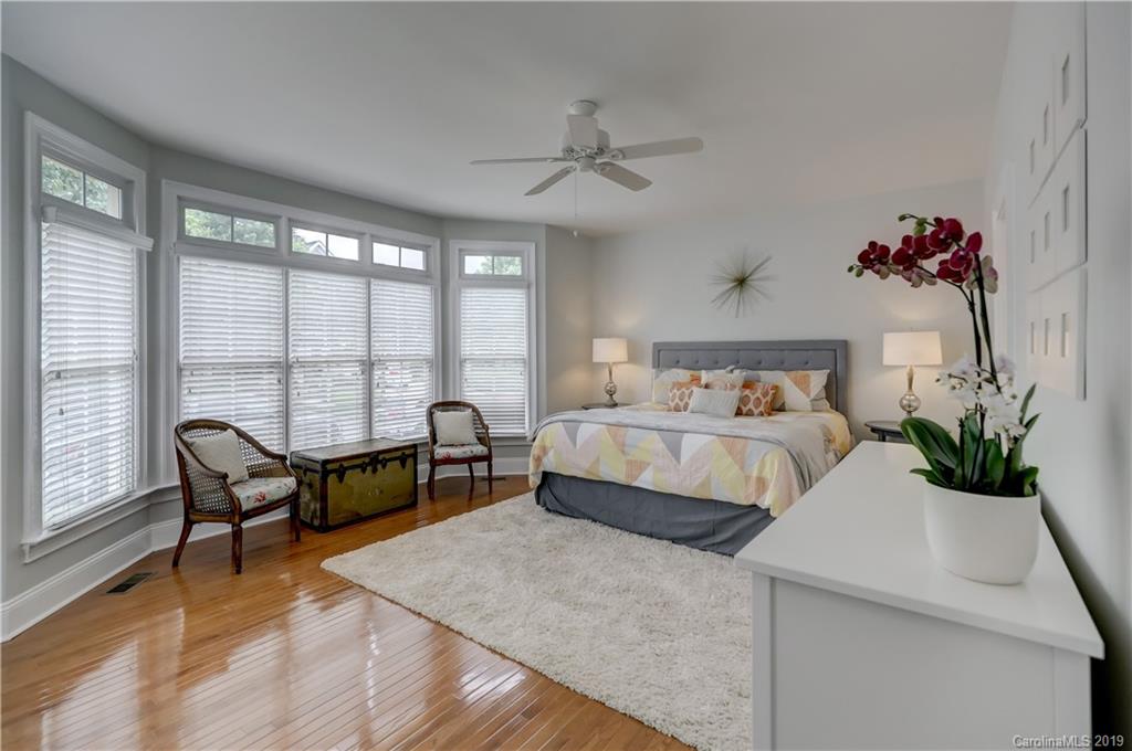 170 Mills Lane, Unit 761 Fort Mill, SC 29708 - Photo 16 of 35 a bedroom with a bed and a couch