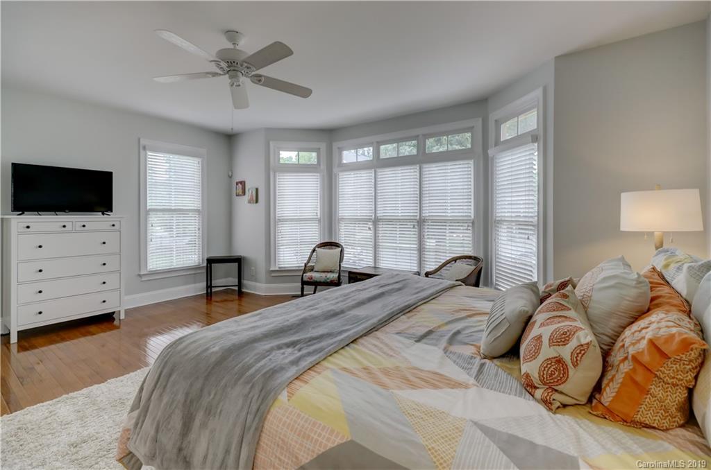 170 Mills Lane, Unit 761 Fort Mill, SC 29708 - Photo 17 of 35 a bedroom with a bed a window and a flat screen television