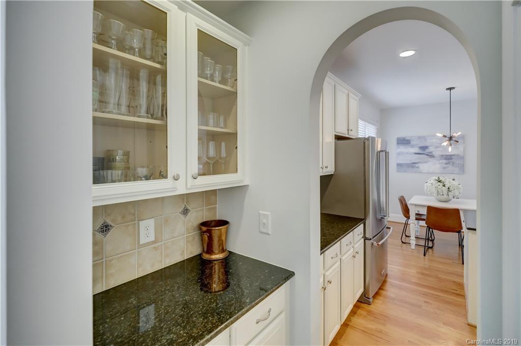 170 Mills Lane, Unit 761 Fort Mill, SC 29708 - Photo 8 of 35 a kitchen with stainless steel appliances granite countertop a refrigerator and a sink