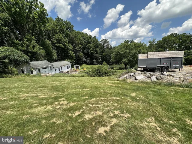 a view of pool table and chairs