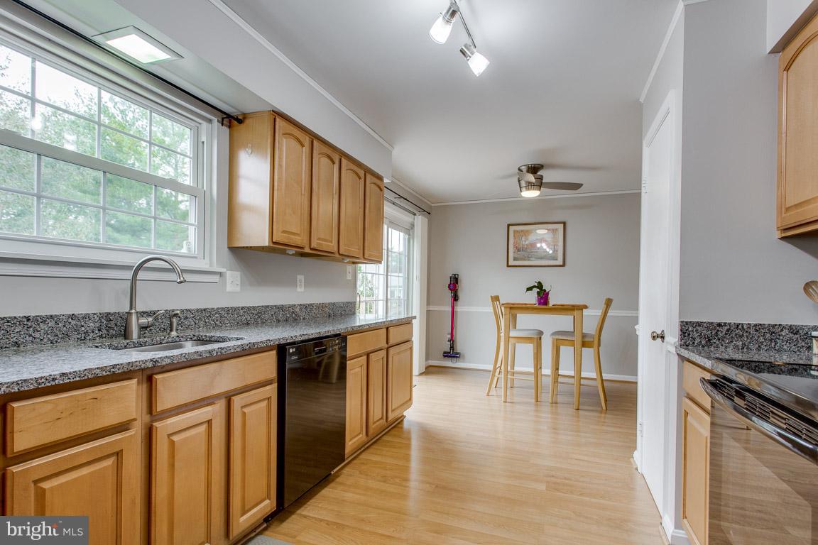 4338 Cub Run Road Chantilly, VA 20151 - Photo 10 of 27 Kitchen has granite counters and harwood flooring