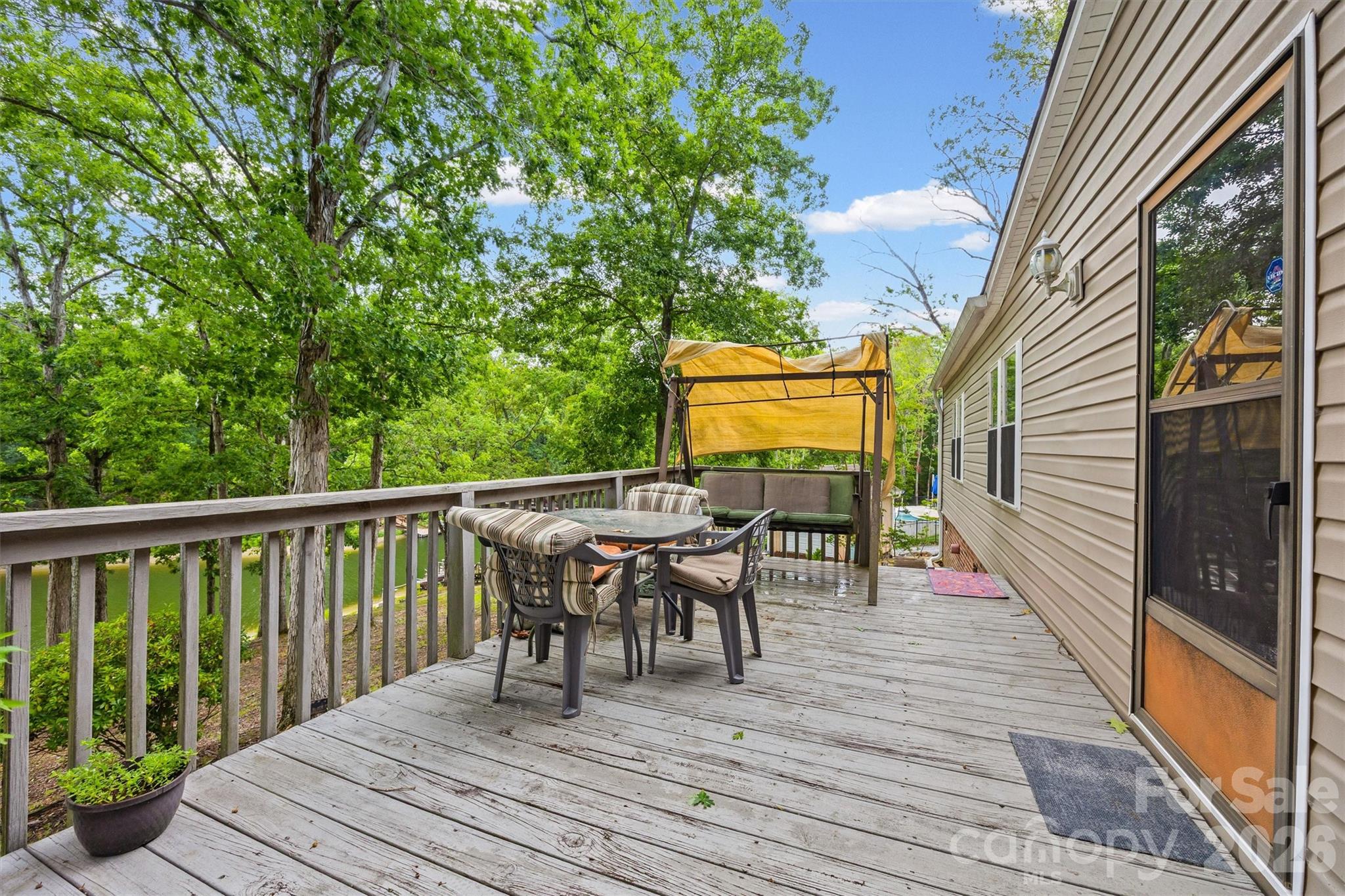 2071 Chameleon Road, Unit 156 York, SC 29745 - Photo 24 of 46 a view of a patio with wooden floor