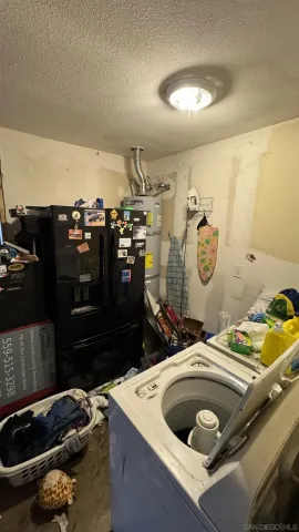 a kitchen with a sink and a stove