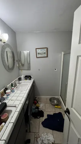 a room with furniture and a mirror