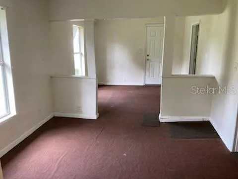 an empty room with windows