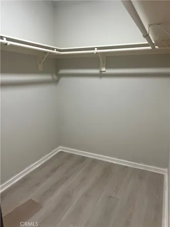 a view of a room with racks on the wall