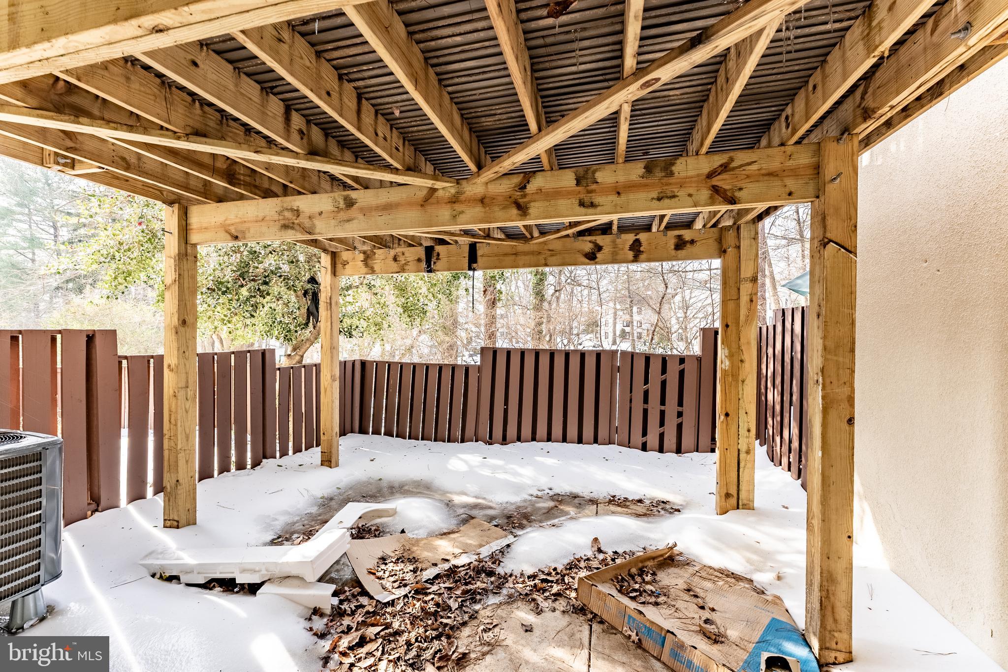 2412 Southgate Square Reston, VA 20191 - Photo 19 of 23 a bed sitting in a balcony next to a yard