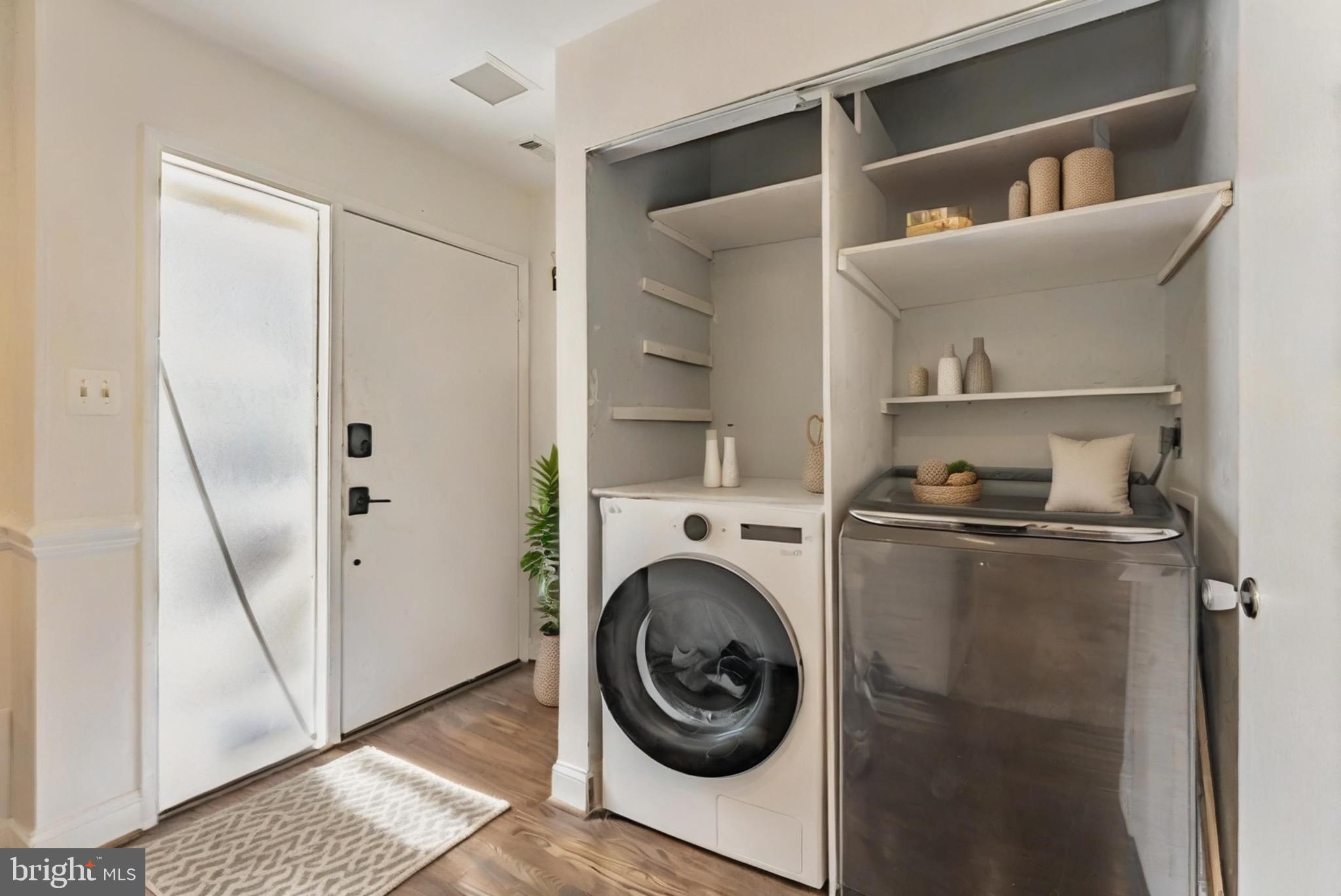 2412 Southgate Square Reston, VA 20191 - Photo 7 of 23 a view of storage and utility room with washer and dryer