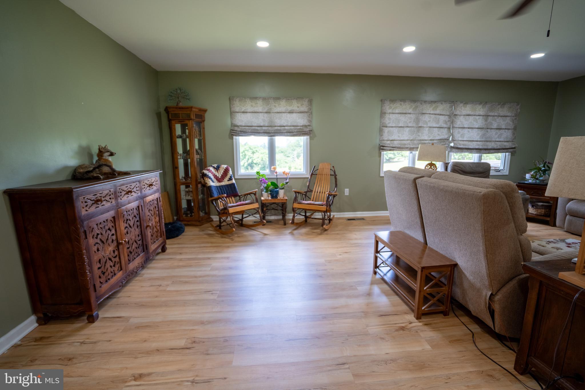 474 Potter Road Hedgesville, WV 25427 - Photo 15 of 40 a living room with furniture window and wooden floor
