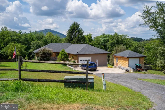 a house view with a garden space