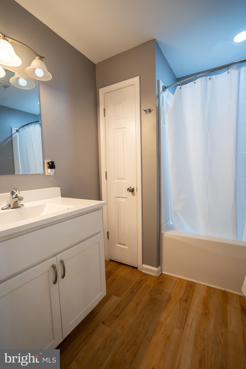 474 Potter Road Hedgesville, WV 25427 - Photo 24 of 40 a bathroom with a sink and a mirror