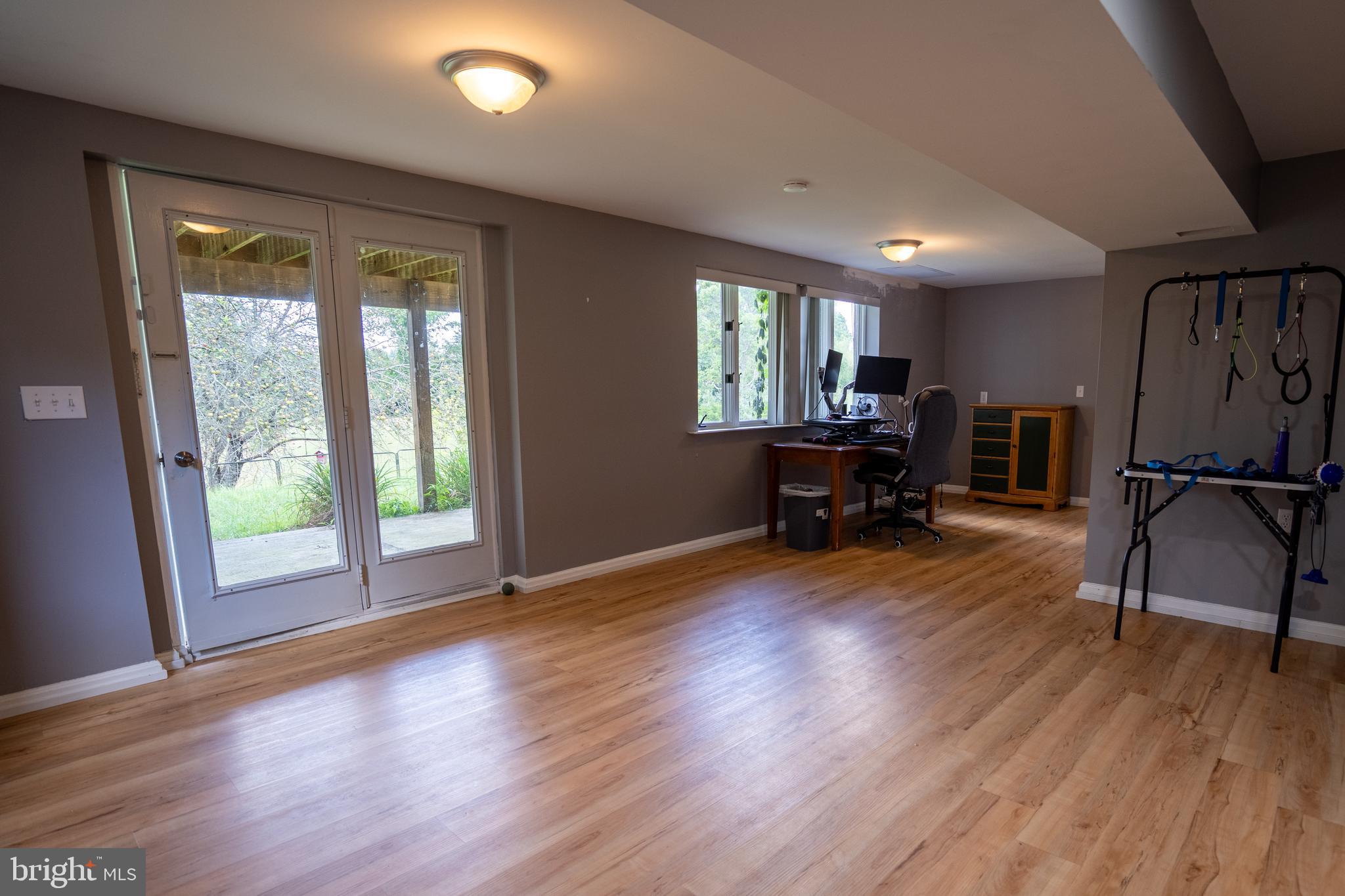 474 Potter Road Hedgesville, WV 25427 - Photo 29 of 40 a living room with furniture and a wooden floor
