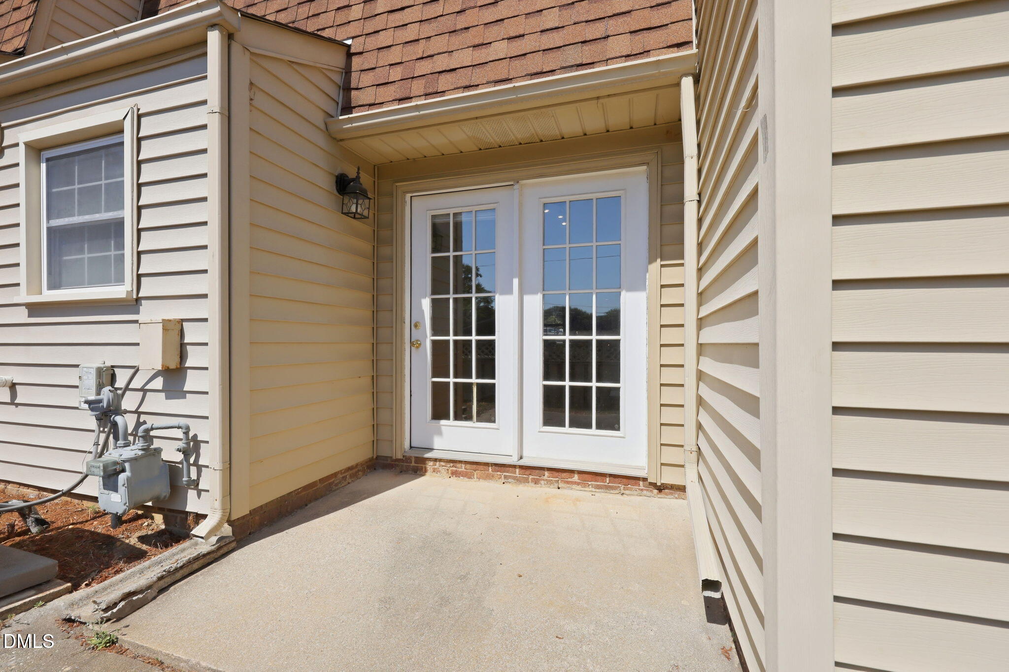 145 Jones Franklin Road, Unit D Raleigh, NC 27606 - Photo 17 of 23 a view of a house with a large window