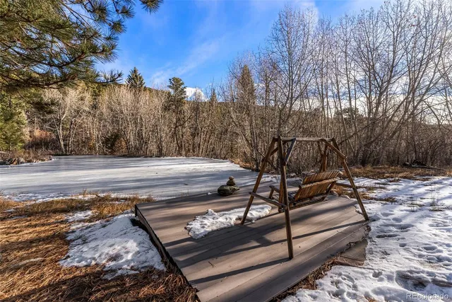a view of a backyard with trees