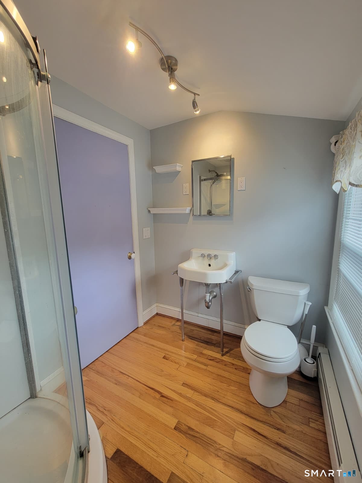 895 Pleasant Valley Road South Windsor, CT 06074 - Photo 14 of 15 a bathroom with a toilet and a mirror