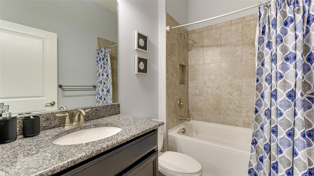 4511 Terrazza Court Lakewood Ranch, FL 34211 - Photo 24 of 65 a bathroom with a granite countertop sink and a mirror