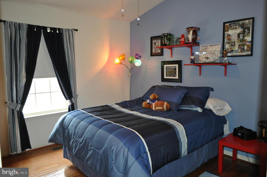 2448 Rippling Brook Road Frederick, MD 21701 - Photo 25 of 30 a bedroom with a bed and window