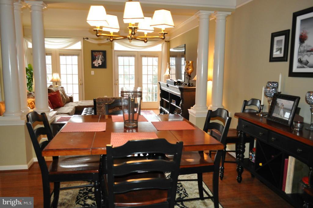 2448 Rippling Brook Road Frederick, MD 21701 - Photo 6 of 30 a view of a dining room with furniture and chandelier