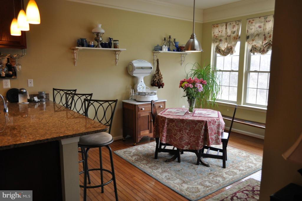 2448 Rippling Brook Road Frederick, MD 21701 - Photo 10 of 30 a view of a dining room with furniture window and outside view