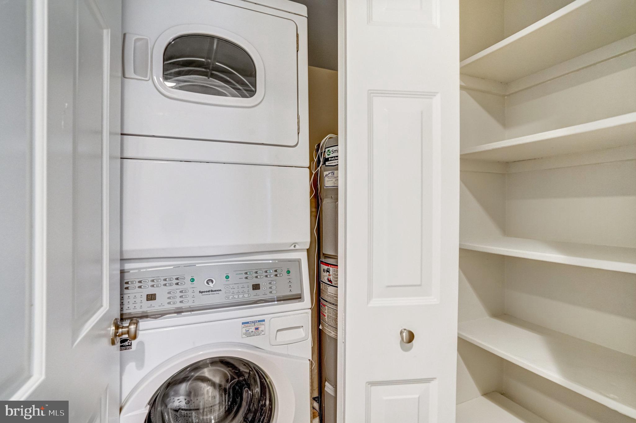 7640 Provincial Drive, Unit 109 McLean, VA 22102 - Photo 22 of 47 a utility room with dryer and washer
