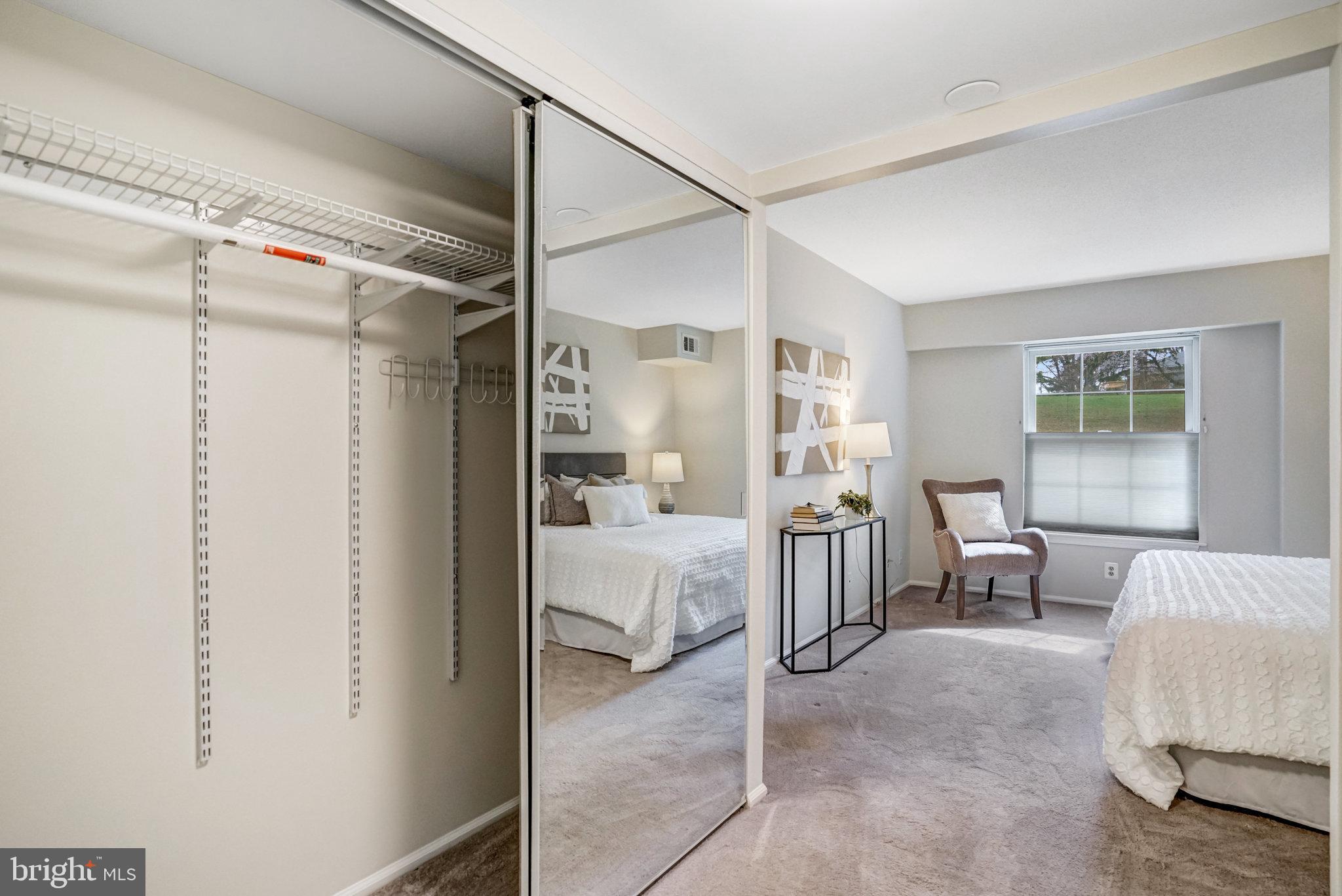 7640 Provincial Drive, Unit 109 McLean, VA 22102 - Photo 28 of 47 a bedroom with furniture and a window