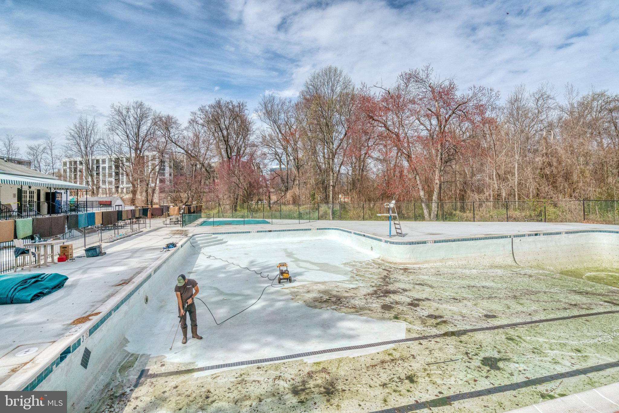 7640 Provincial Drive, Unit 109 McLean, VA 22102 - Photo 38 of 47 a view of a swimming pool with a yard