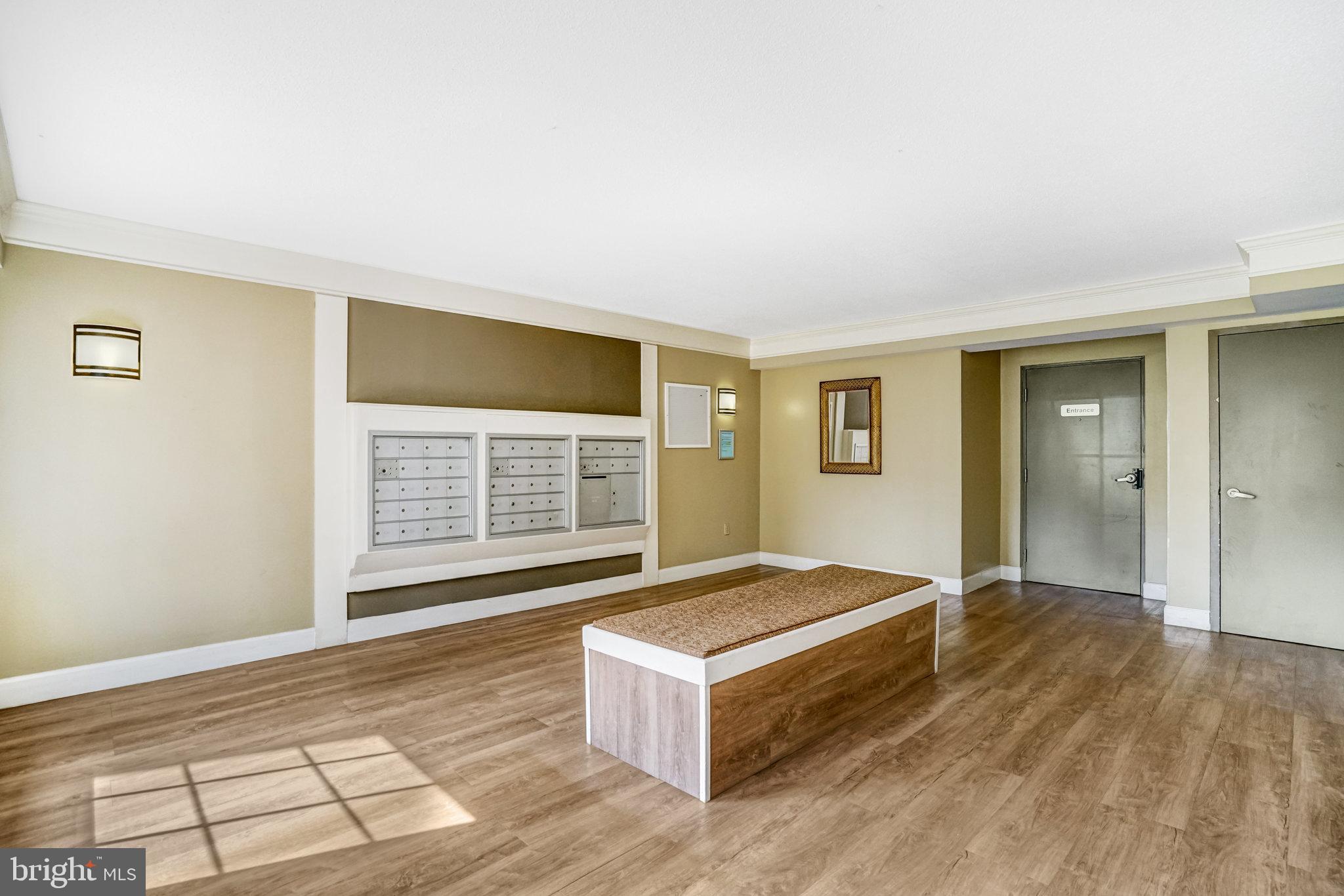 7640 Provincial Drive, Unit 109 McLean, VA 22102 - Photo 5 of 47 a spacious bedroom with a bed and a window