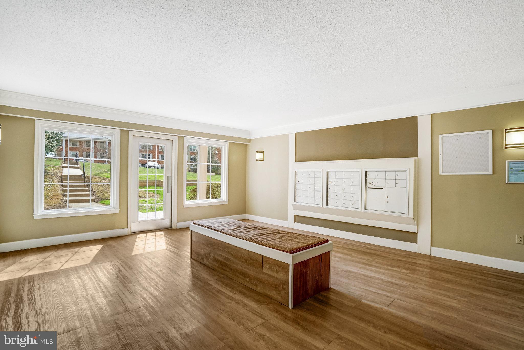 7640 Provincial Drive, Unit 109 McLean, VA 22102 - Photo 6 of 47 a living room with furniture pool table and a window