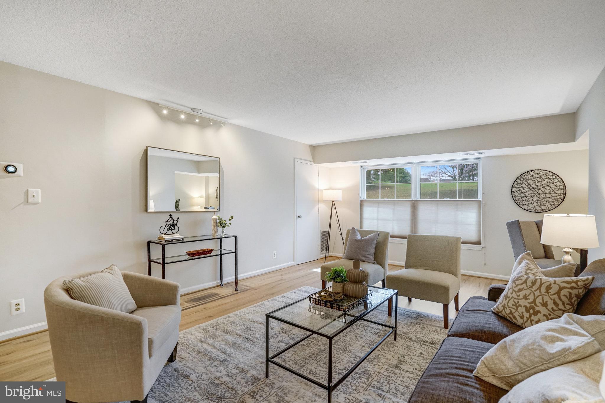 7640 Provincial Drive, Unit 109 McLean, VA 22102 - Photo 9 of 47 a living room with furniture