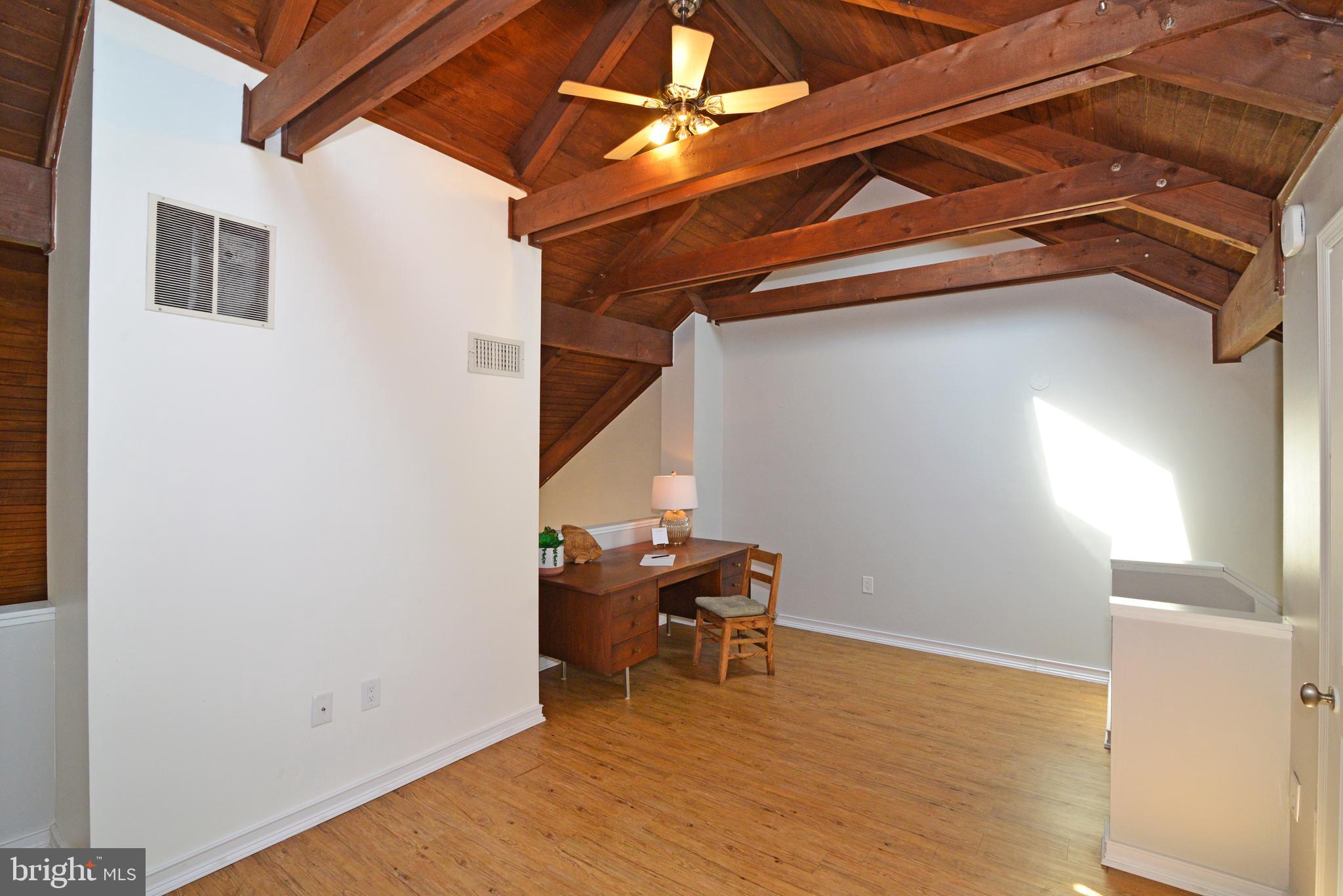 11142 Glade Drive Reston, VA 20191 - Photo 42 of 47 Enjoy vaulted ceilings and a ceiling fan.