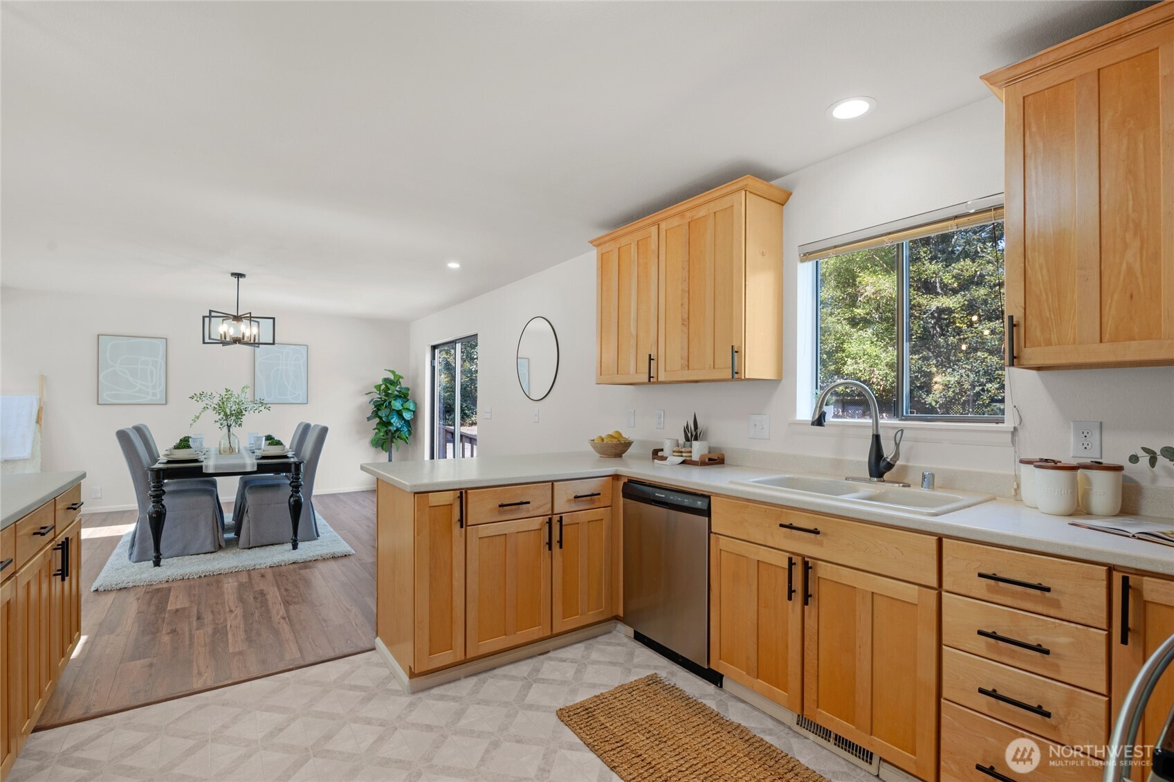 22124 49th Avenue Southeast Bothell, WA 98021 - Photo 18 of 39 a kitchen with sink cabinets and window