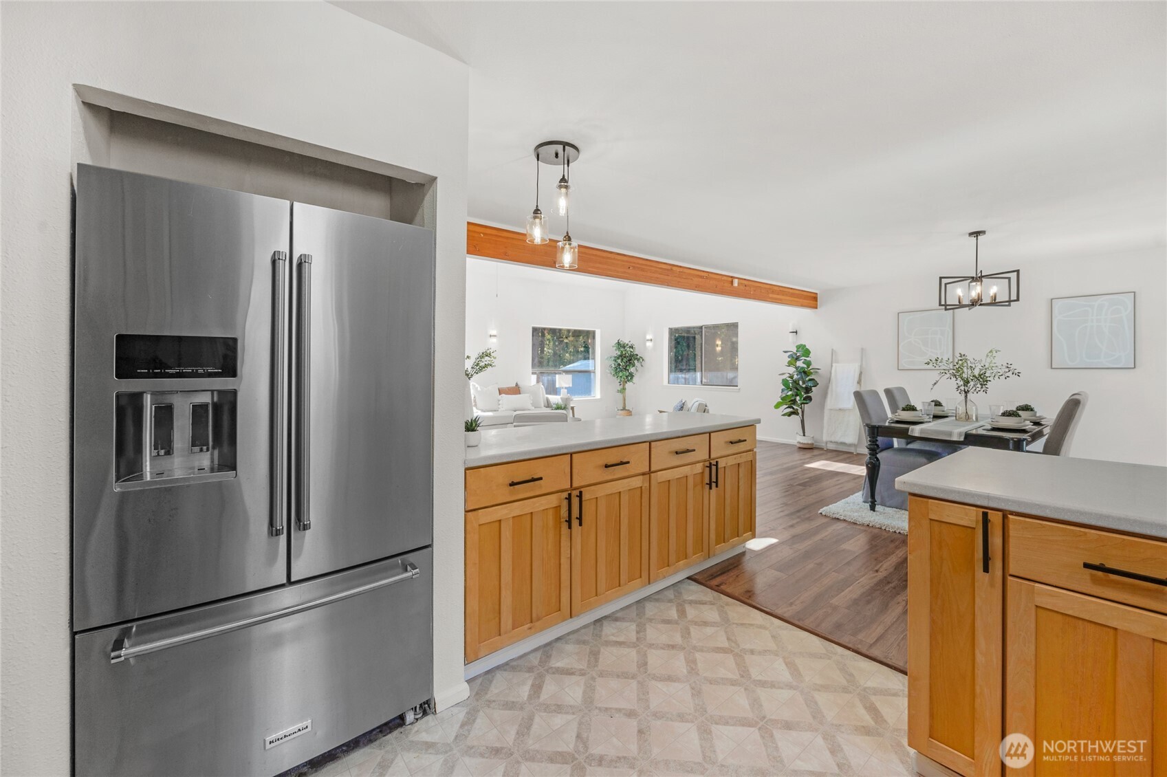 22124 49th Avenue Southeast Bothell, WA 98021 - Photo 19 of 39 a kitchen with stainless steel appliances granite countertop a refrigerator and a sink