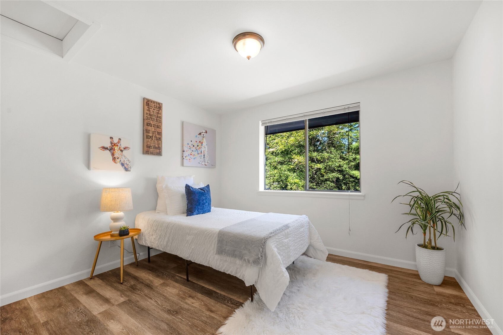 22124 49th Avenue Southeast Bothell, WA 98021 - Photo 31 of 39 a bedroom with a bed and a window