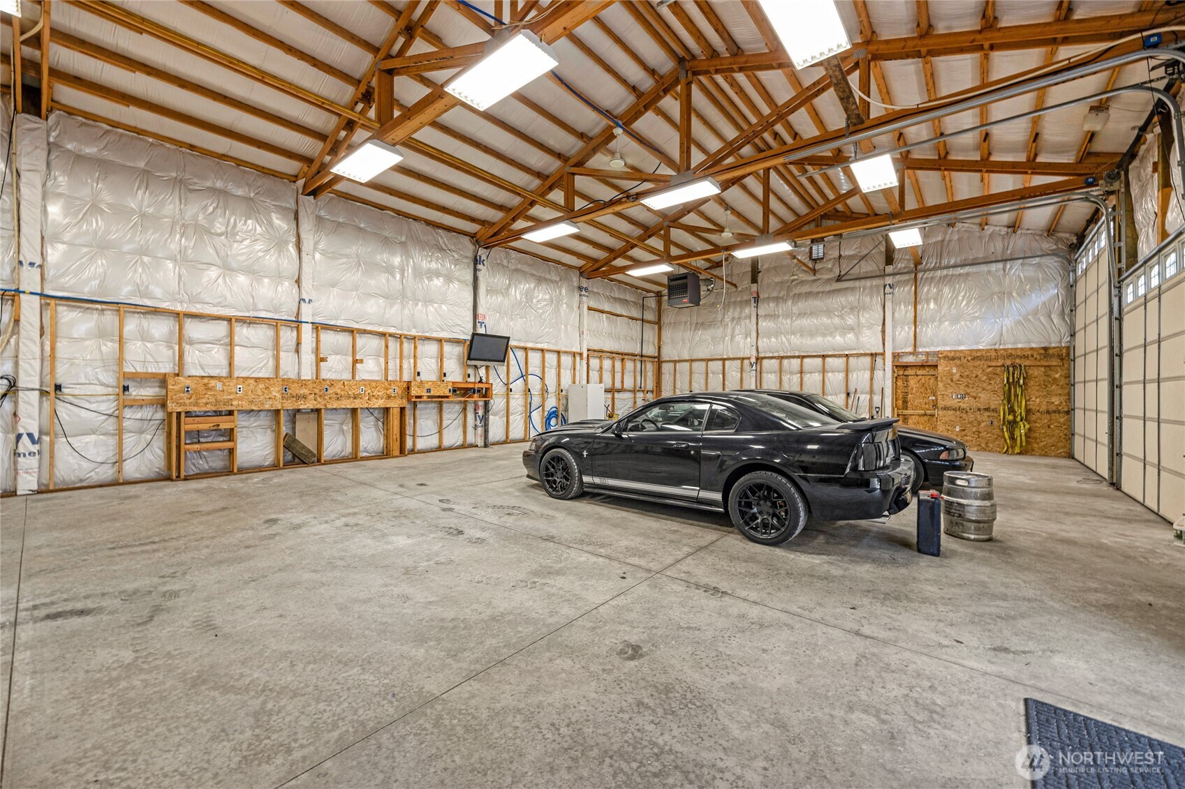 22124 49th Avenue Southeast Bothell, WA 98021 - Photo 33 of 39 a view of parking garage with cars parked