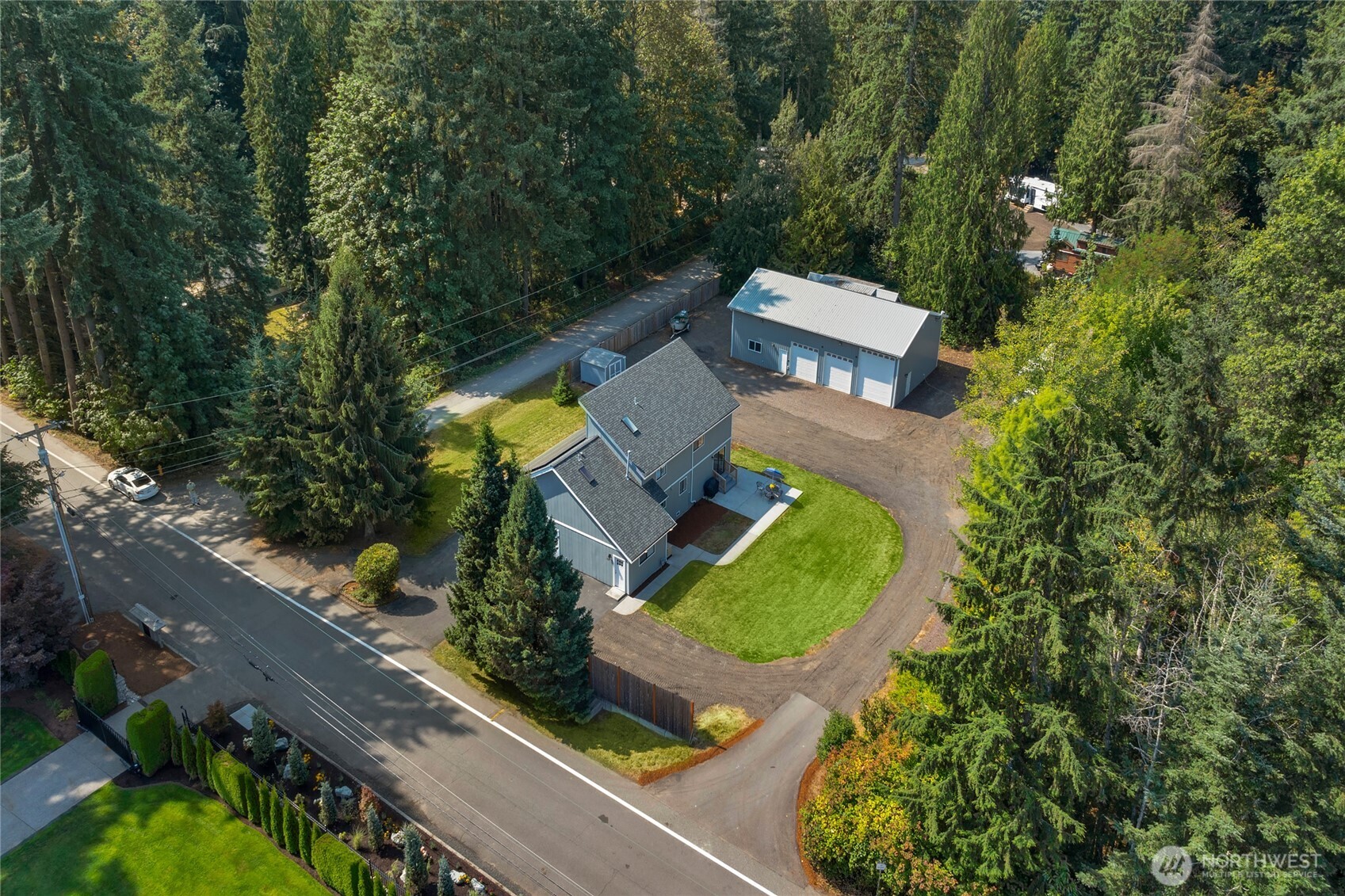 22124 49th Avenue Southeast Bothell, WA 98021 - Photo 38 of 39 an aerial view of a house with swimming pool and outdoor space