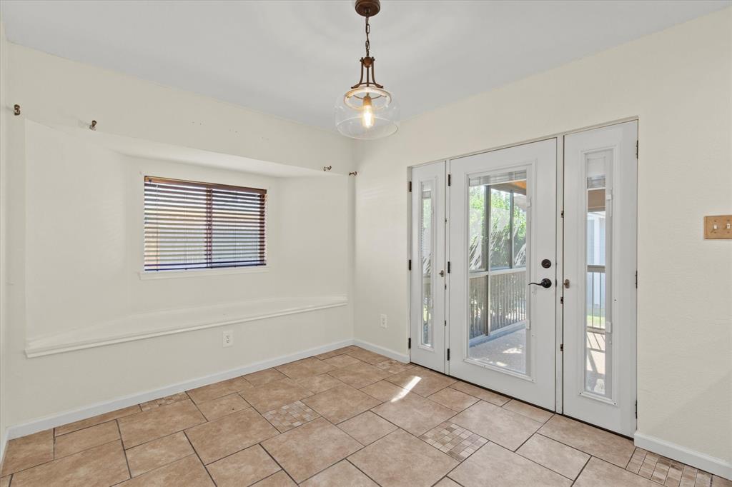 2201 Driskell Lane Corinth, TX 76210 - Photo 18 of 40 a view of a room with cabinet and shower