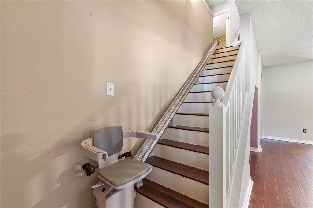 2201 Driskell Lane Corinth, TX 76210 - Photo 20 of 40 a view of entryway and hall with wooden floor