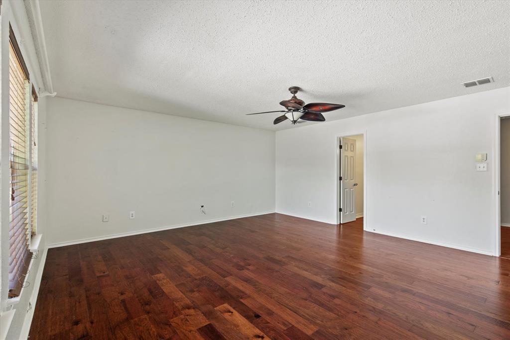 2201 Driskell Lane Corinth, TX 76210 - Photo 23 of 40 wooden floor in an empty room