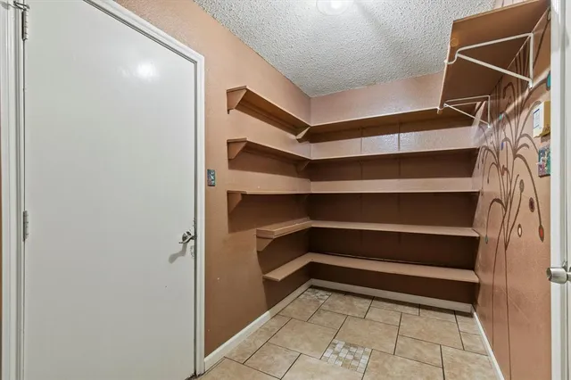 a view of balcony with wooden floor