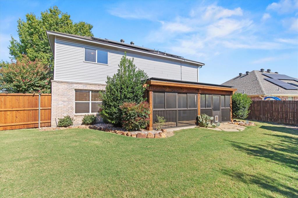 2201 Driskell Lane Corinth, TX 76210 - Photo 36 of 40 a backyard of a house with yard and outdoor seating