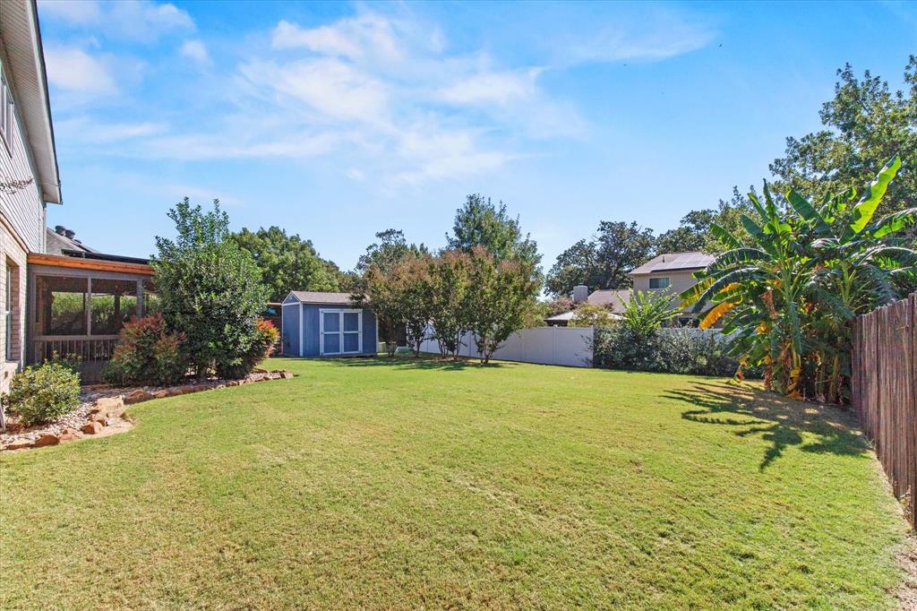 2201 Driskell Lane Corinth, TX 76210 - Photo 40 of 40 a view of big yard with a house in the background
