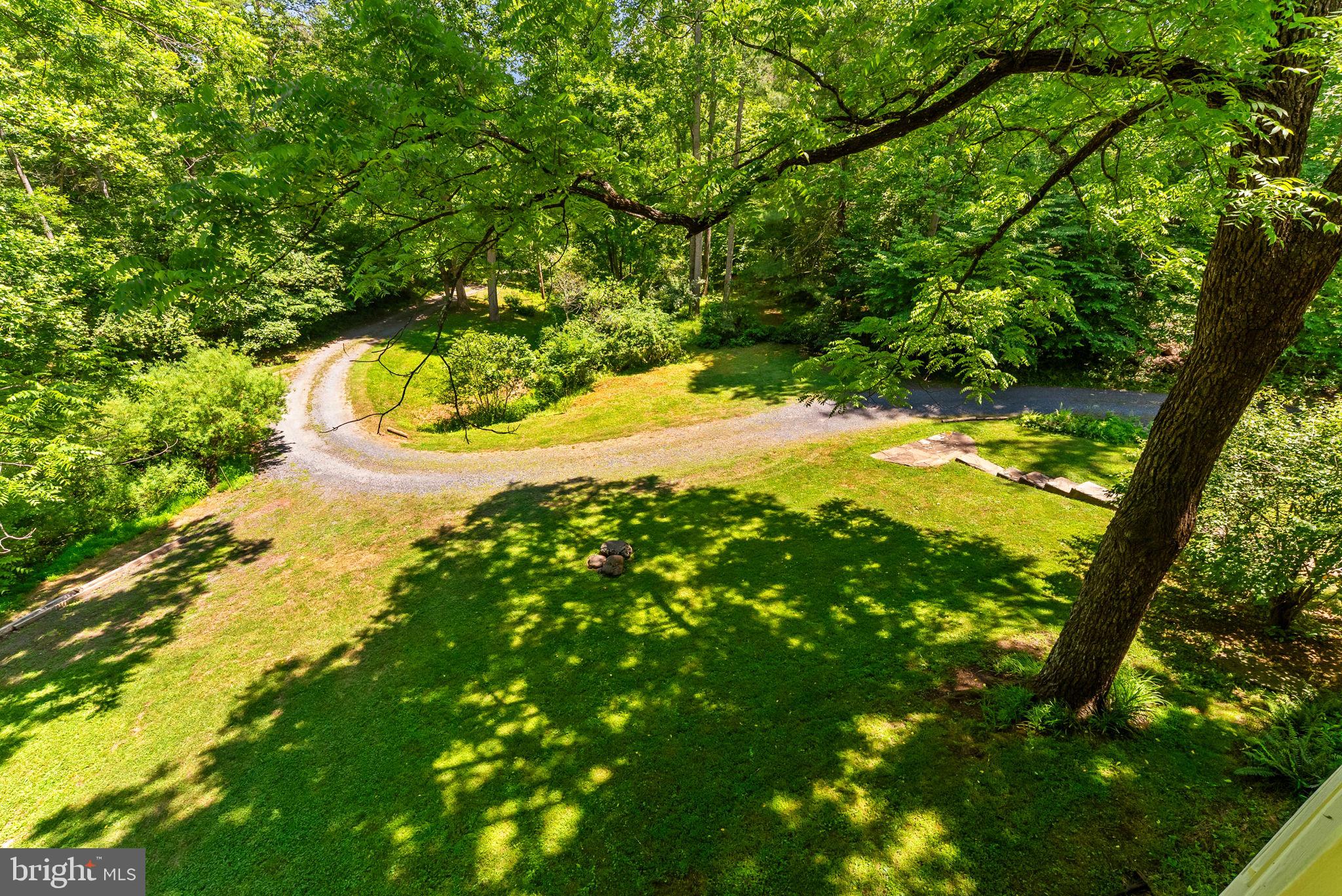 9406 Obannons Mill Road Boston, VA 22713 - Photo 28 of 34 Solid entry bridge leads to a lovely drive in